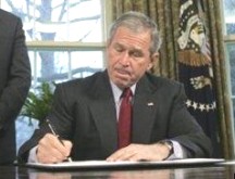Bush signing documents